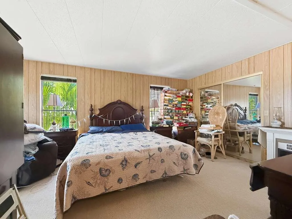Primary suite with mirrored closet