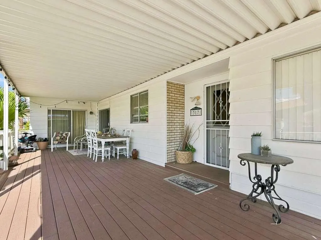 covered deck and main entrance