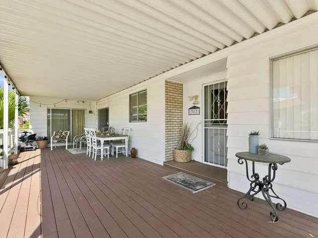 covered deck and main entrance