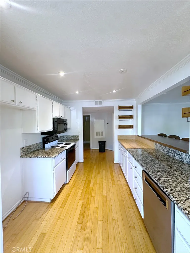 Kitchen opens to dining room for entertaining