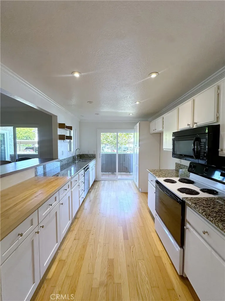 Kitchen flows to expansive patio