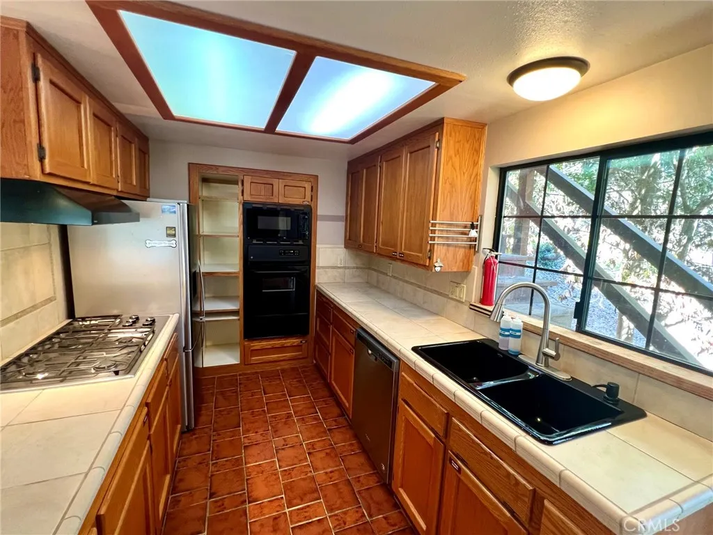 Cozy galley kitchen with everything you need at your fingertips.