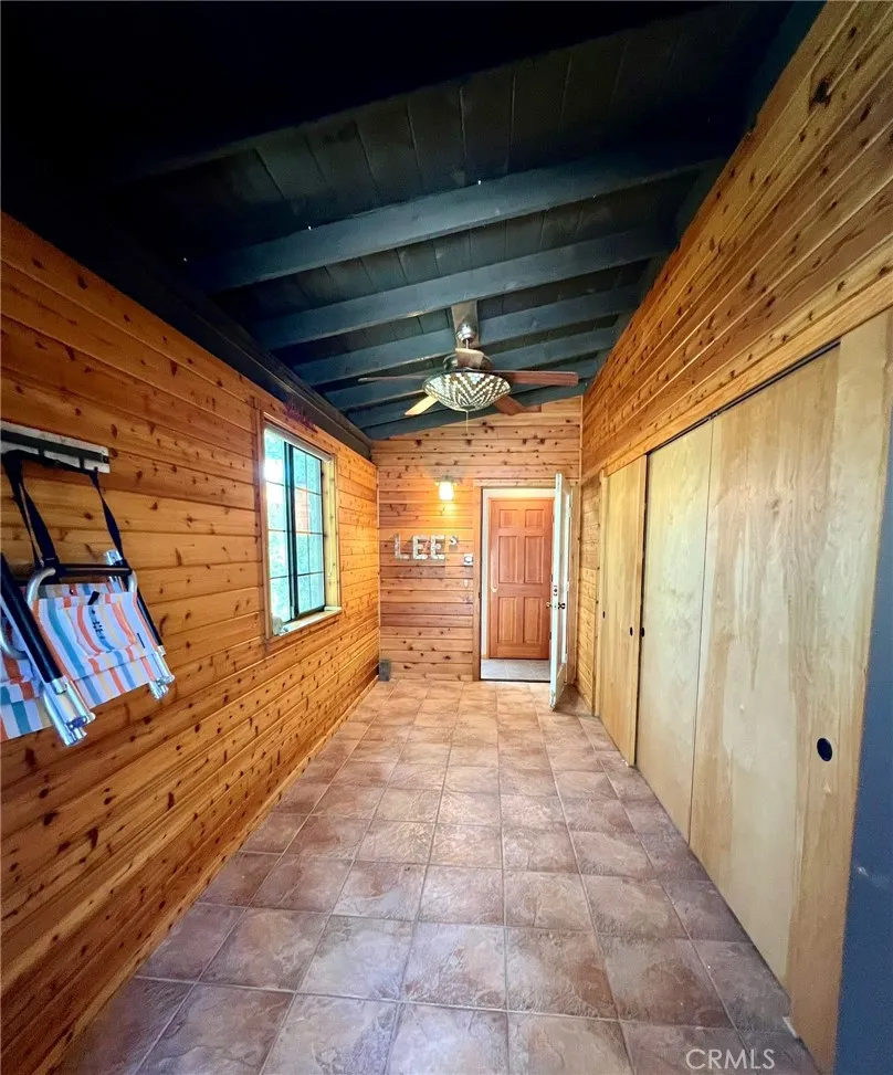 Just inside the front door, Garage is on the right behind the doors.