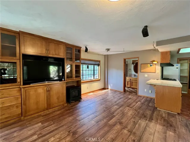Built in cabinetry, sound system and TV already installed for your streaming subscriptions.