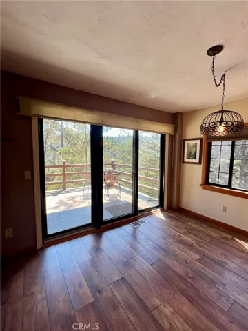 Living room sliding glass doors to the main deck