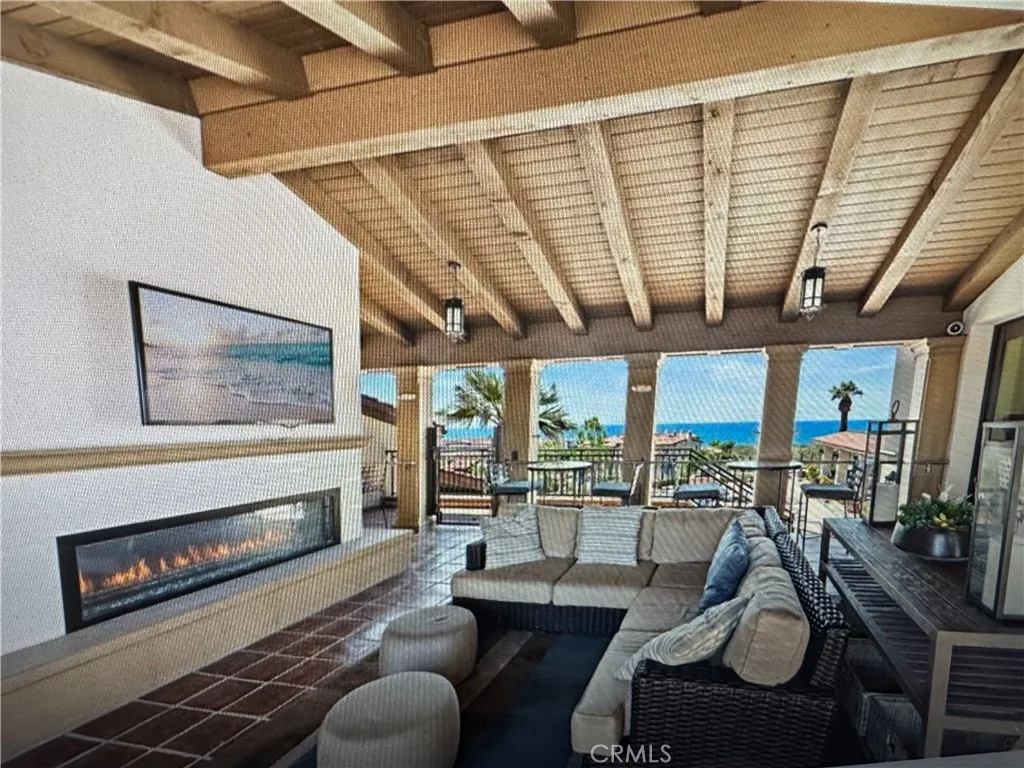 Upstairs loggia with fireplace