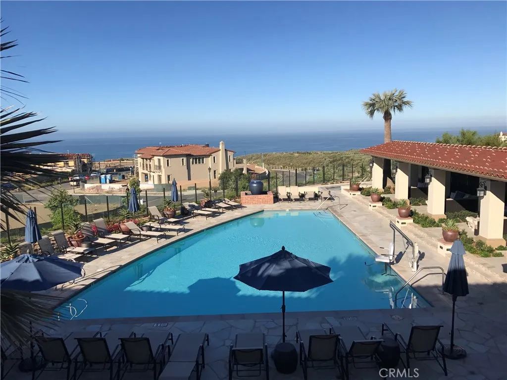 Resort like "Summit club" featuring beautiful clubhouse with catering kitchen-private cabanas-gym-loggia with fireplace-outdoor firepits all overlooking the Pacific ocean