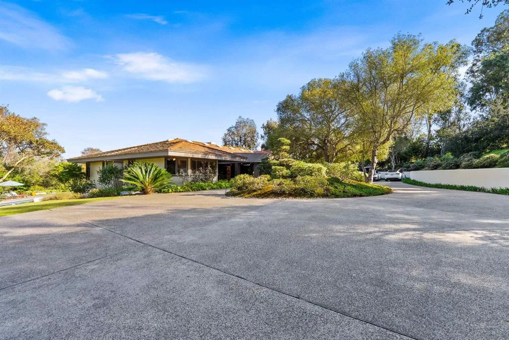 Large outdoor driveway with lots of parking for guests and family!