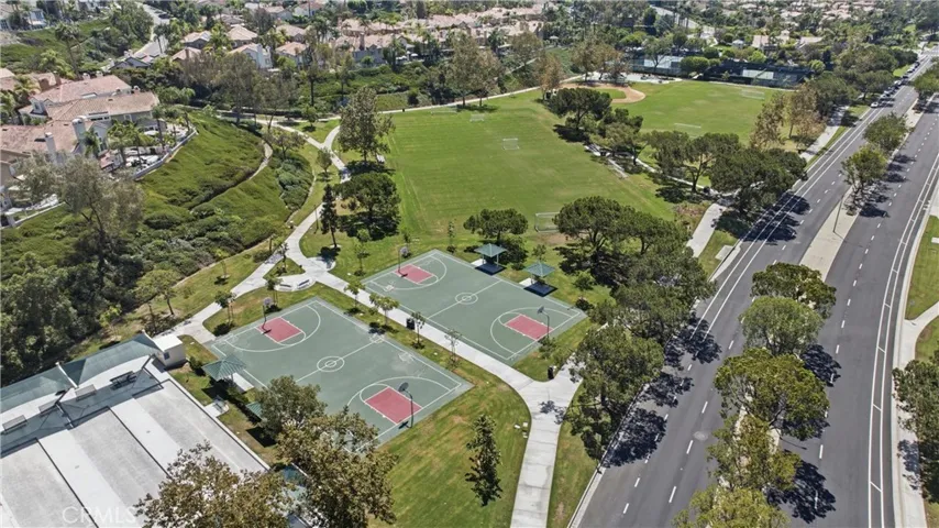 Marina Hills recreation courts surrounded by mature landscaping and neighborhood greenbelts.