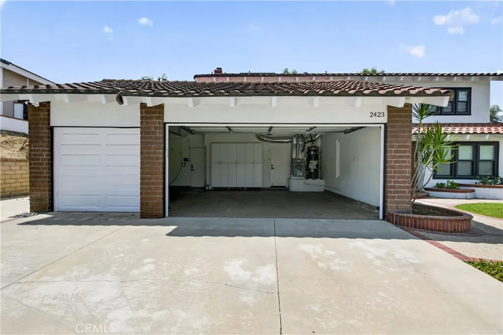 Spacious three-car garage with ample storage space.
