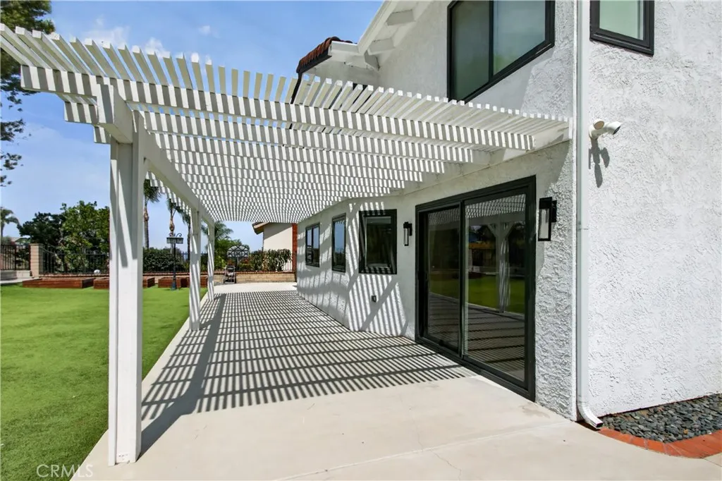 Spacious covered patio area perfect for outdoor dining and entertaining.