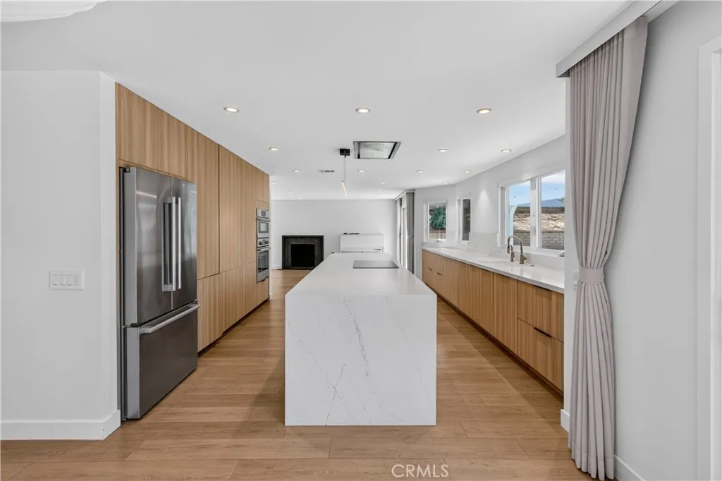 Modern kitchen with premium finishes and high-end appliances.