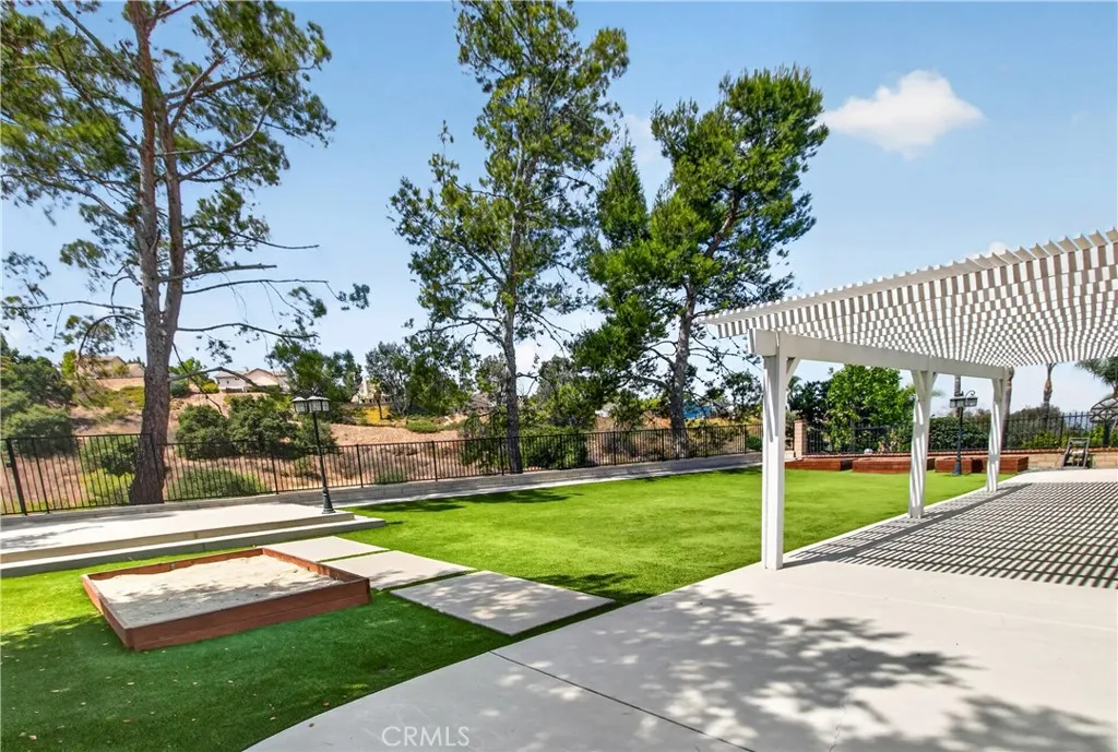 Spacious backyard featuring a scenic view.