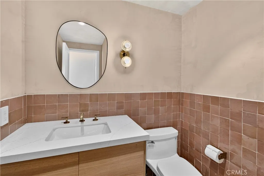 Guest bathroom featuring fine finishes.