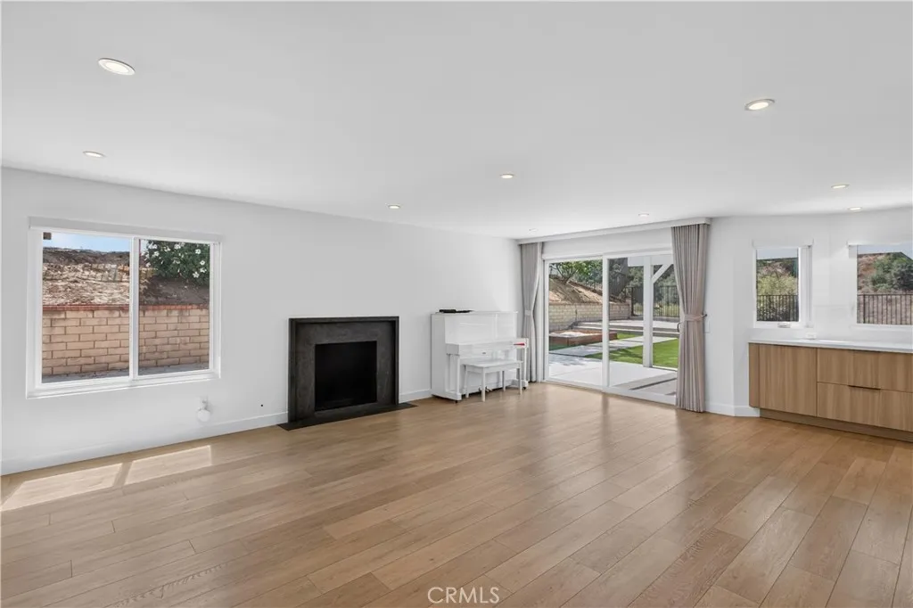 Spacious family room with an open-concept layout leading directly into the kitchen.