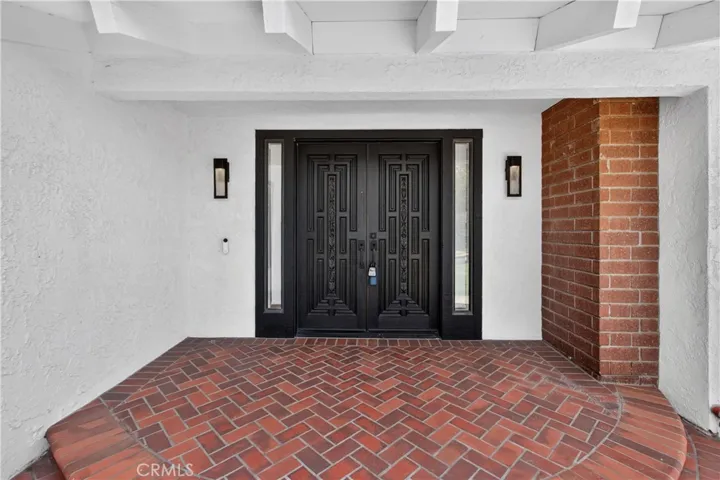 Double Door Entry with Brick Porch
