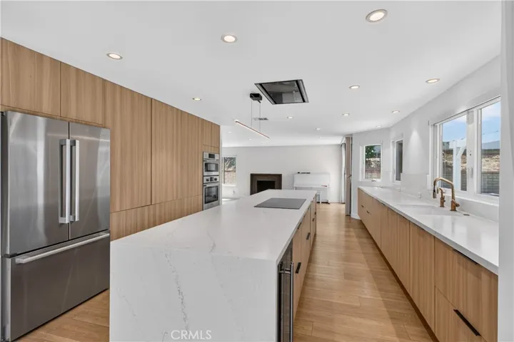Spacious chef's kitchen with a large island and ample seating.