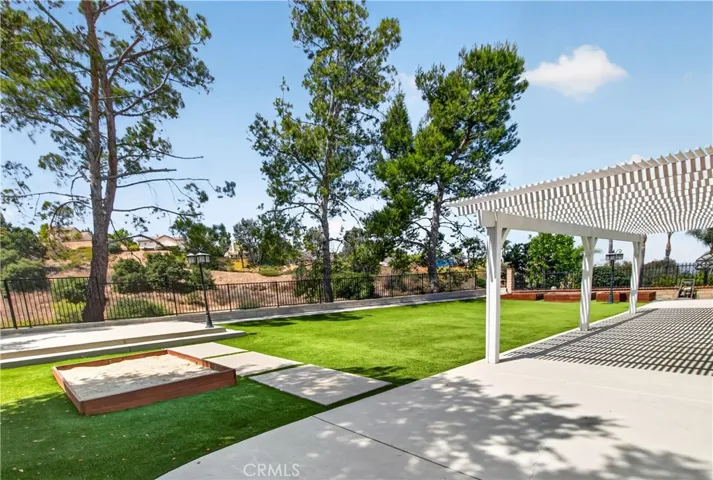 Spacious backyard featuring a scenic view.