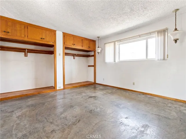 rear lower level bedroom is missing flooring