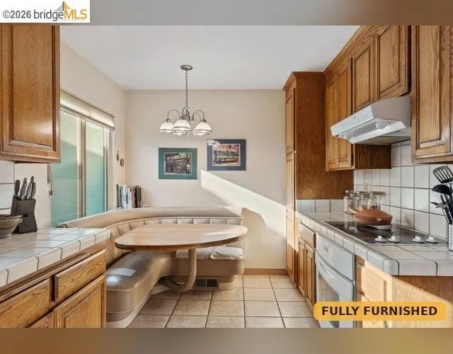 Charming dinette style eat in kitchen.