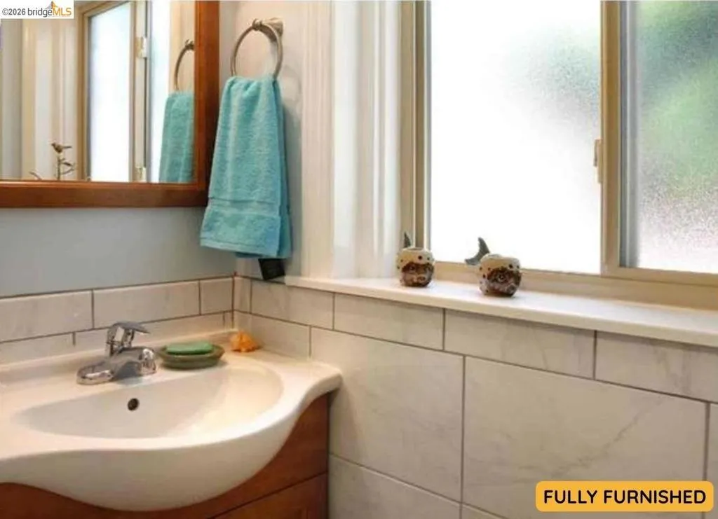 Full bathroom 2 downstairs with shower is en suite to bedroom 3.
