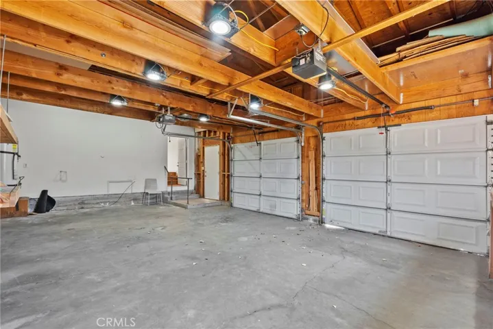 Garage with entry shown to Apartment
