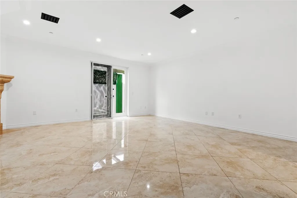 Large, open floor living room with private patio Large, open floor living room with private patio