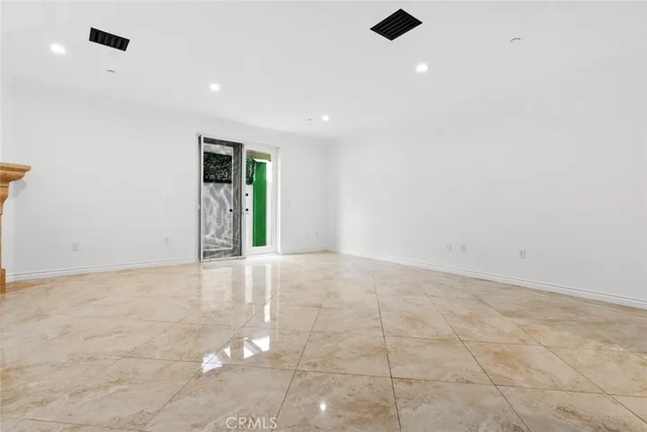 Large, open floor living room with private patio