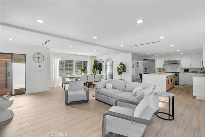 Living room with TV and fireplace