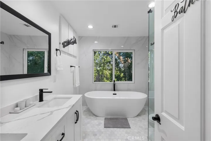 Bath 2 upstairs (tub and shower)
