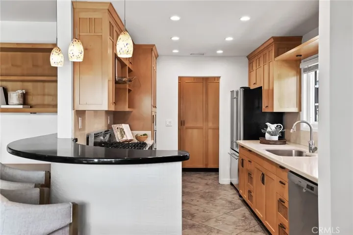 Breakfast Bar in Kitchen, designer pendant lighting.