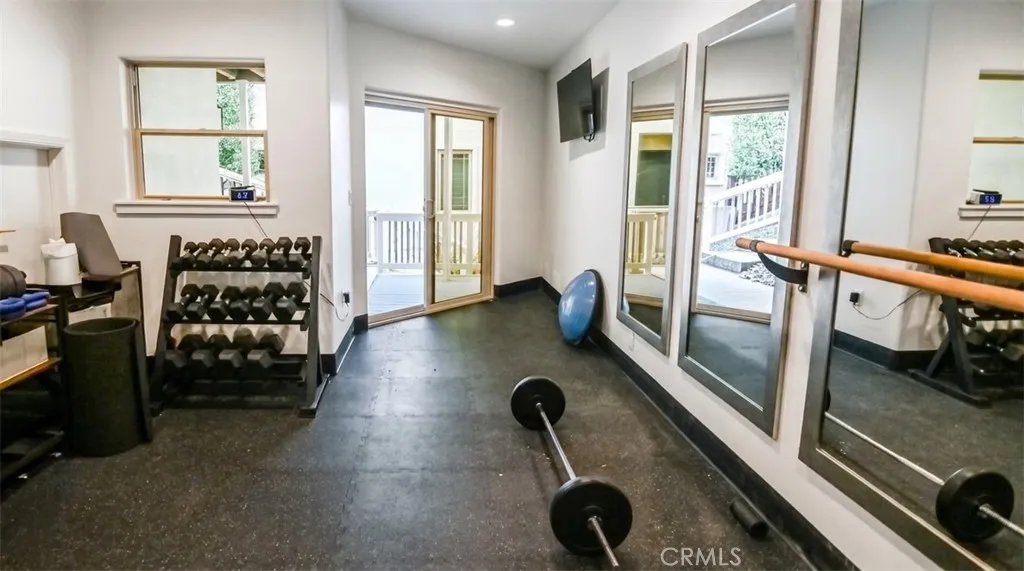 Work out room with Tonal and weights Work out room with Tonal and weights