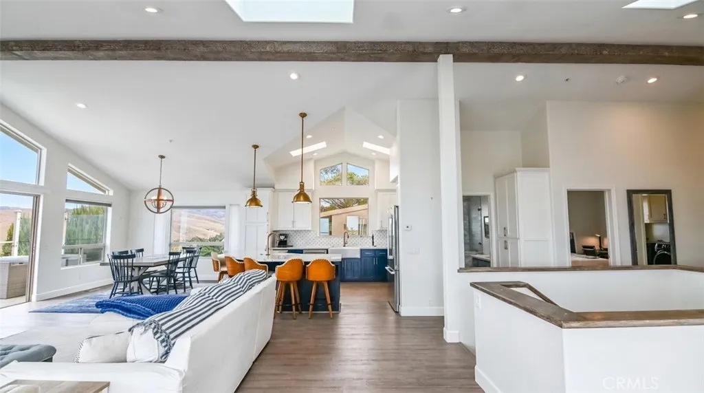 kitchen, dining room, to of staircase to the lower level. kitchen, dining room, to of staircase to the lower level.