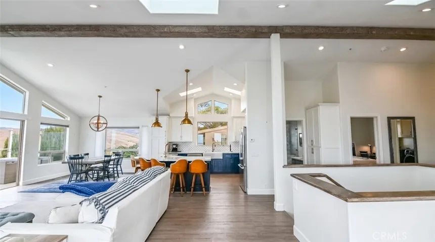 kitchen, dining room, to of staircase to the lower level.