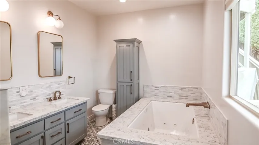 Master suite bathroom with jetted tub
