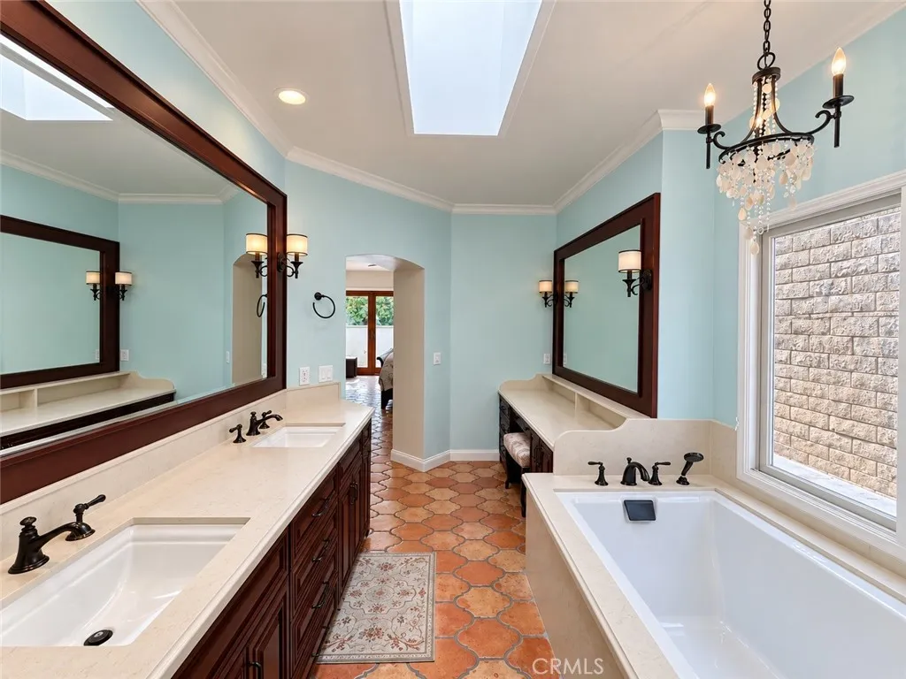 A separate bathtub and a dedicated dressing area