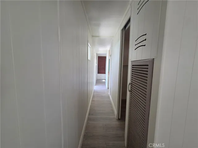 hallway facing bedroom #2 at the end