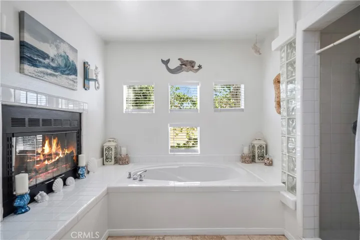 Virtually altered/staged with flames in fireplace