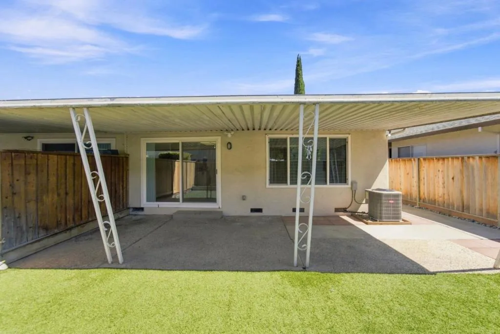 backyard with A/C unit