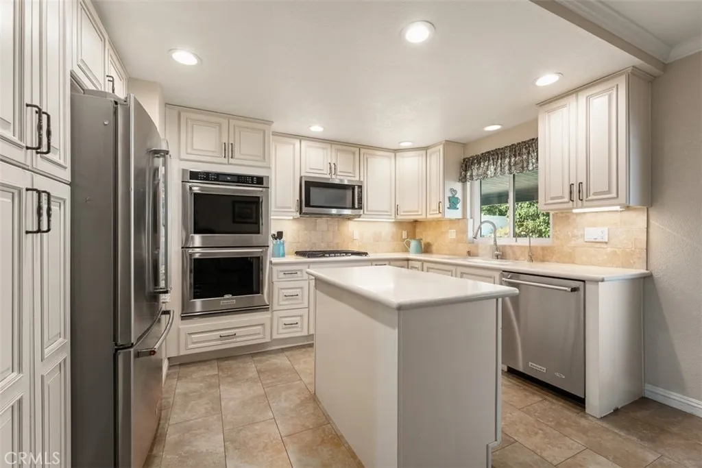 Newly updated island kitchen complete with dual oven and stainless steel appliances throughout Newly updated island kitchen complete with dual oven and stainless steel appliances throughout