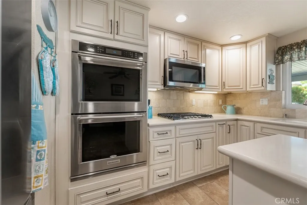 Top-of-the-line appliances include dual oven, stainless steel microwave, and stove top Top-of-the-line appliances include dual oven, stainless steel microwave, and stove top