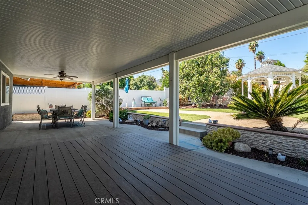 Oversized, aluminum covered patio complete with ceiling fan and composite decking Oversized, aluminum covered patio complete with ceiling fan and composite decking
