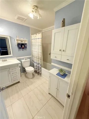 Recently upgraded tile floors, vanity, shower enclosure at hall bathroom