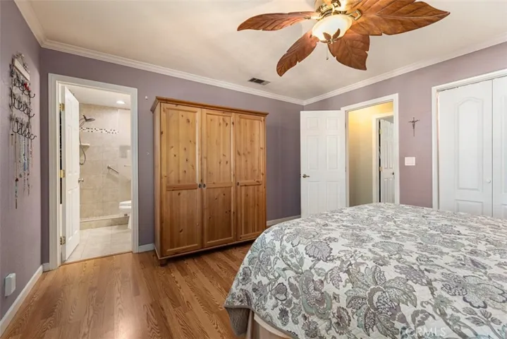 Primary bathroom features en suite remodeled bathroom