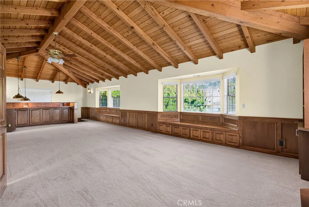 Upstairs Den/ Flexible Space with vaulted ceilings, bay windows, reading nooks, built in storage