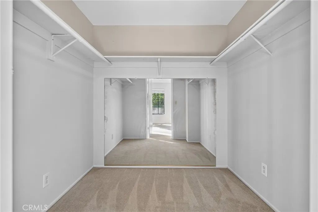 Walk in closet in Upstairs bedroom 1