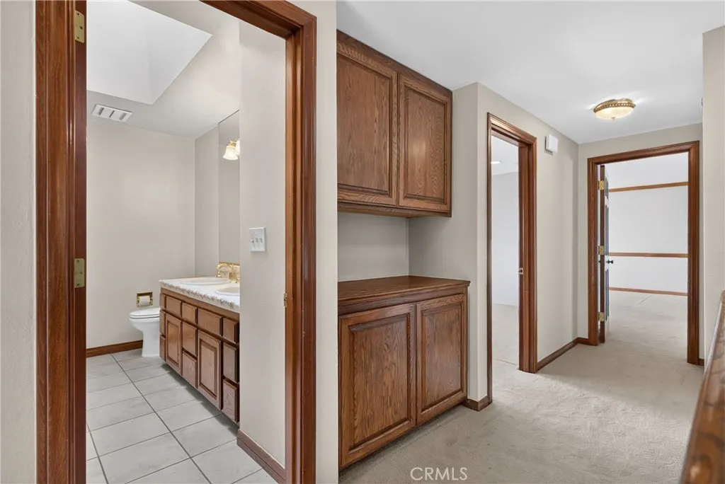 Hallway with linen closets