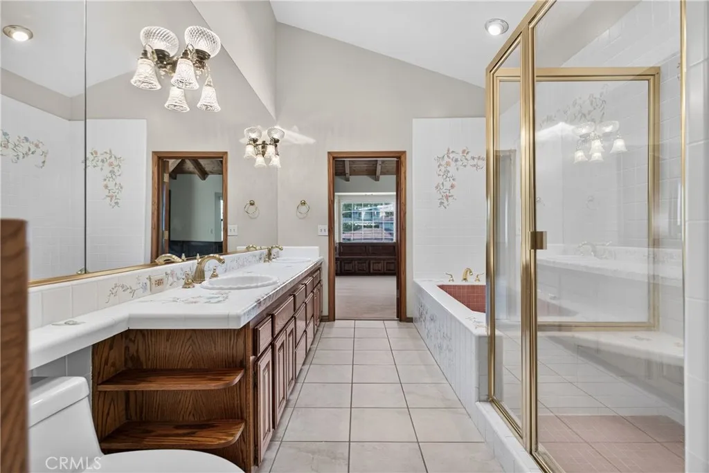 Primary Ensuite Bathroom with dual sinks, vanity area, soaking tub, shower, walk in closet (Bath 3)