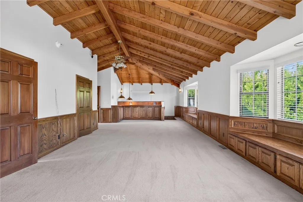 Upstairs Den/ Flexible Space with vaulted ceilings, bay windows, reading nooks, built in storage