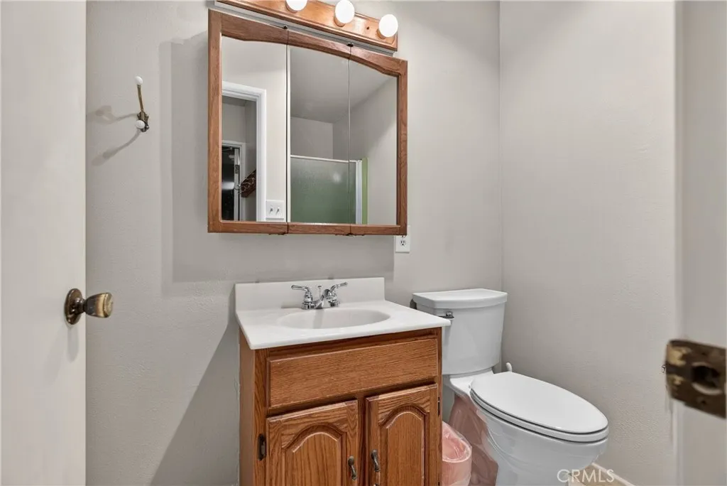 Bathroom 4 - downstairs with shower- accessible from garage and backyard- great for pool shower